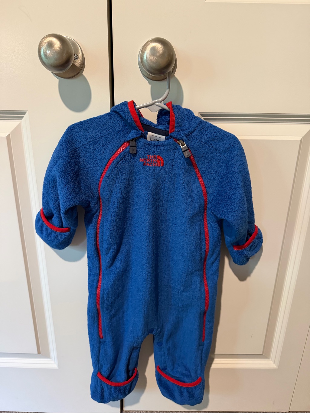 The North Face Blue Fleece One-Piece With Red Trim For Infants